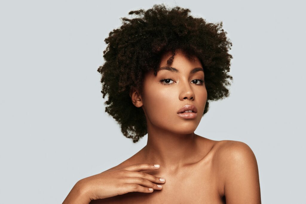Portrait of a Black woman representing awareness of uterine fibroids and women's reproductive health.